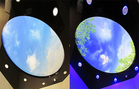 Twin ART Потолок Twin ART Vision, это «изюминка» вашего интерьера. Рисунок на таком потолке проявляется в зависимости от освещения. При дневном свете полотно будет выглядеть с одной фотопечатью или одноцветным, при включенной светодиодной подсветкой, расположенной за полотном, на натяжном потолке проявится иное изображение.